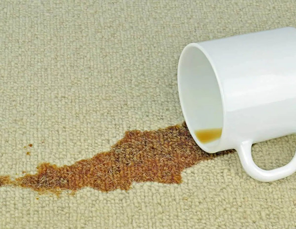 Coffee spill on a carpet before professional spot removal service in San Pedro, CA